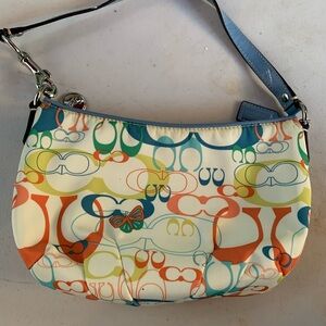 Coach Blue Mini Bag with Playful Pattern